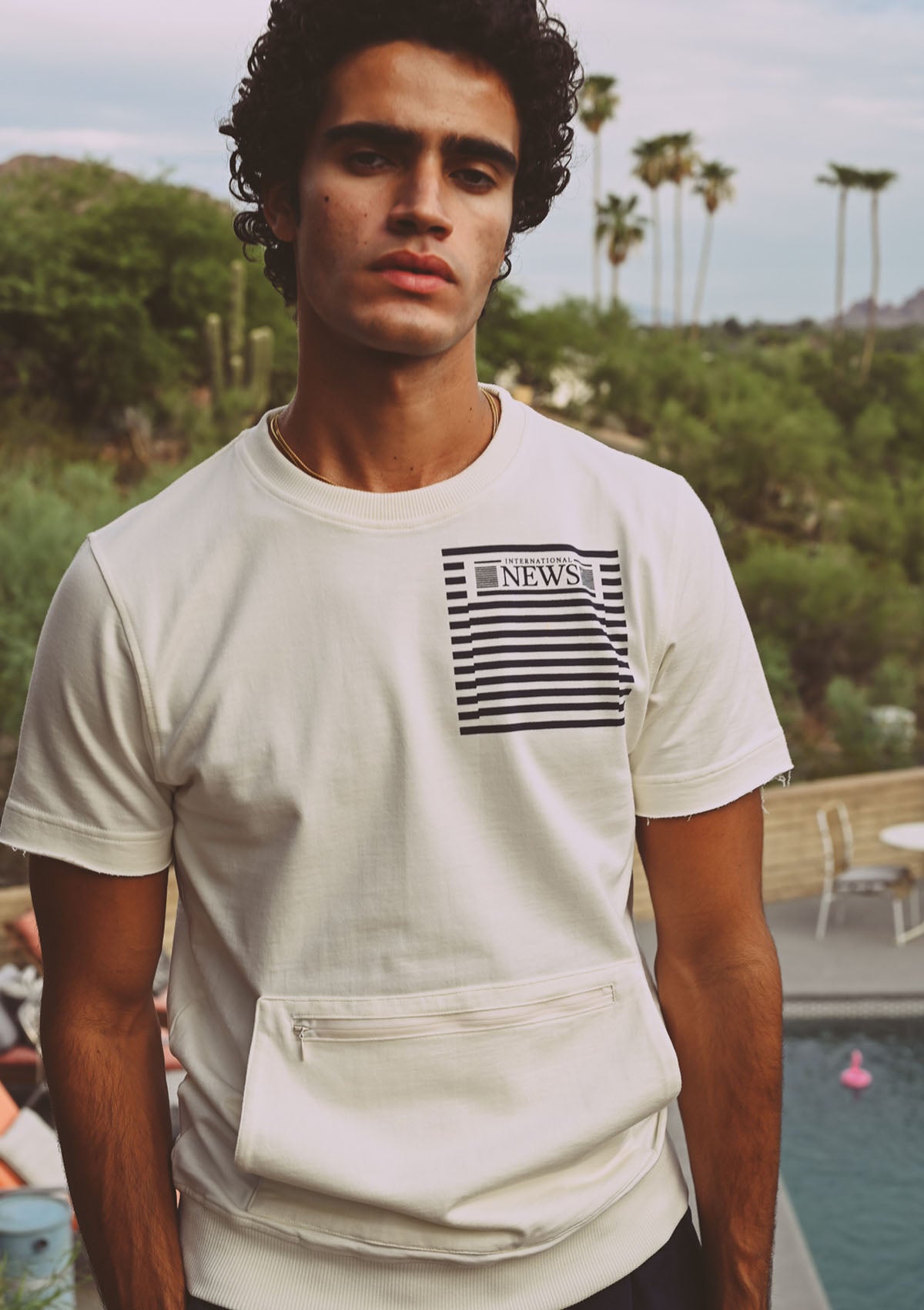 Stacked Paper Short Sleeve Sweatshirt – International News, Inc.